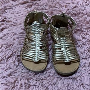 Gold gladiator style straps sandals